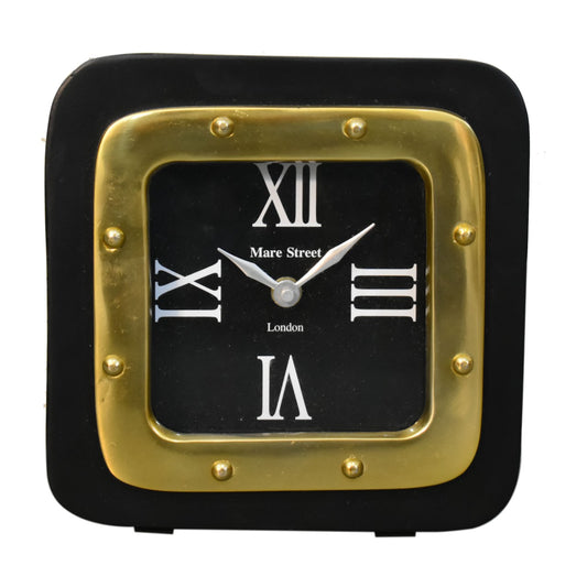 Petite horloge de table noire et dorée